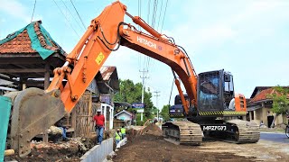 Hitachi Zaxis 200 Excavator Installing Precast U Ditch For The Road Storm Drain [upl. by Flodnar844]