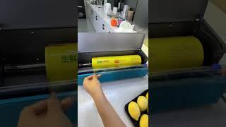 The simple cling film packaging machine is simple to operate and convenient to pack [upl. by Marybella707]