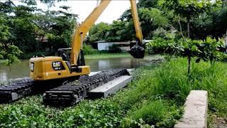 amphibious excavator AX 330  CAT 320 GC long arm Ultratrex pontoon swamp undercarriage  training [upl. by Stein]