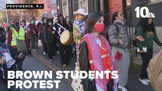 Demonstration held at Brown University to protest divestment decision [upl. by Magulac732]