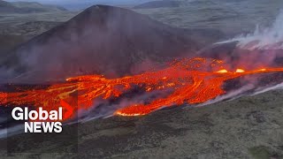 Iceland volcano eruption sends fiery lava down slopes [upl. by Eylatan639]