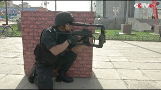 Chinese Police Display Weapons to Residents in NW China City [upl. by Sucirdor263]