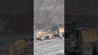 Construction Machine in Action Clearing Some Mud With CAT 18M3 Motor Grader [upl. by Gemmell]