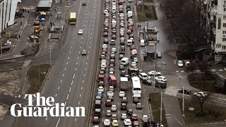 Long lines of traffic as people flee Ukraines capital [upl. by Heddie]