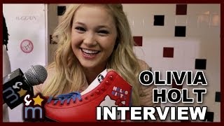 Olivia Holt Talks quotI Didnt Do Itquot amp Shows Off Roller Skates [upl. by Atisor212]