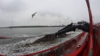 Suction Hopper Dredger loading inland vessels with sand [upl. by Barri]