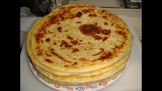 How To Cook Soft Layered Kenyan Chapati  Parathas  Bread [upl. by Jenelle936]