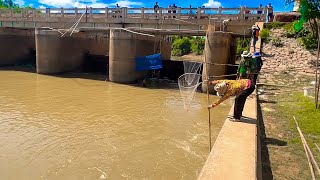 Real life net fishing  scoop net fishing in the river woman man trying to catch fish [upl. by Angid]