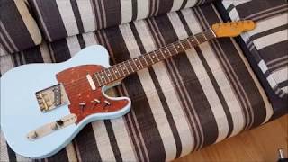 Brass vs Titanium Saddles in Telecaster [upl. by Kcirtapnhoj552]