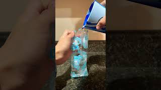 Pouring water into a clear ice cream bag [upl. by Maccarthy155]