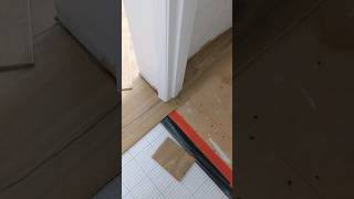 Plank flooring around door jam in 20 seconds [upl. by Akzseinga]