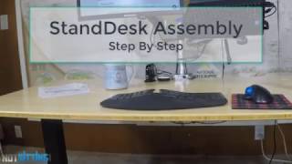 StandDesk Standing Desk Assembly In FastMo [upl. by Ennovihs]