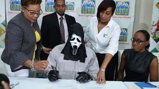 Lottery winner claims prize in Scream mask to hide identity [upl. by Vally]