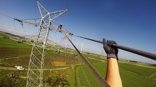 110KV Freileitung Hochspannungsleitung abseilen zum Ausbau der Steigleitungen [upl. by Baerl784]